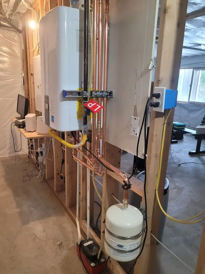 Licensed plumber repairing a kitchen sink in Yonkers